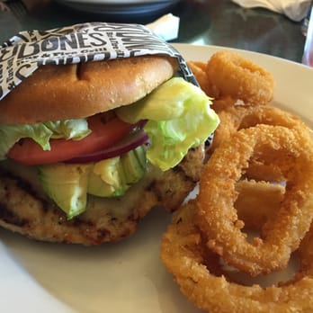 Smokey Bones Tyngsboro - Avocado turkey burger with onion ring upgrade. - Barbeque Near Me - Tyngsboro, Massachusetts
