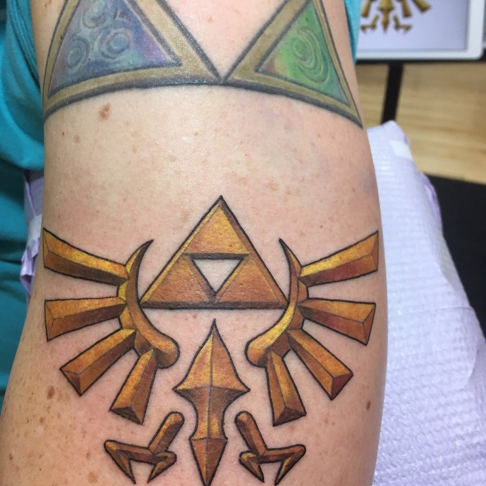 Andy's Flying Tiger Tattoo - The Crest of the Royal Family of Hyrule by Megan. - Tattoo Near Me - Cincinnati, Ohio Andy's Flying Tiger Tattoo - The Crest of the Royal Family of Hyrule by Megan. - Tattoo Near Me - Cincinnati, Ohio