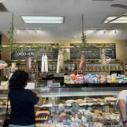 Zia's Delicatessen - Inside has this nice clear case with 2 little sections to shop imports.