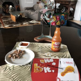 bb.q Chicken Kahala - Everything laid out with a Satoru Abe sculpture in the background - Chicken Wings Near Me - Honolulu, Hawaii
