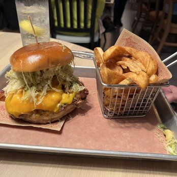 Guy Fieri's Kitchen + Bar - Bacon Mac-N-Cheese Burger with 3 types of fries. - American Near Me - Council Bluffs, Iowa Guy Fieri's Kitchen + Bar - Bacon Mac-N-Cheese Burger with 3 types of fries. - American Near Me - Council Bluffs, Iowa