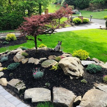 MJ Landscape - a landscaped garden with rocks and trees - Landscaping Near Me MJ Landscape - a landscaped garden with rocks and trees - Landscaping Near Me
