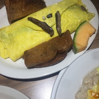 Jines Restaurant - Mushroom omelet. Stuffed with blue cheese, 2 types of mushrooms, and spinach. Came with toast - Greek Near Me - Rochester, New York Jines Restaurant - Mushroom omelet. Stuffed with blue cheese, 2 types of mushrooms, and spinach. Came with toast - Greek Near Me - Rochester, New York