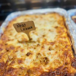 Amale Tre Focacceria - Meat lasagna made with fresh pasta sheets and cheeses . Made fresh daily