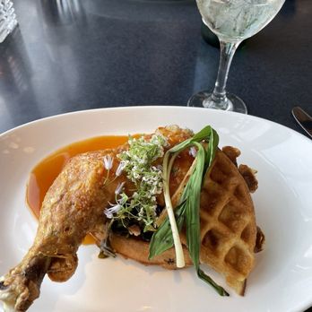 Topside - Confit chicken and waffles with greens - New American Near Me - Baltimore, Maryland Topside - Confit chicken and waffles with greens - New American Near Me - Baltimore, Maryland