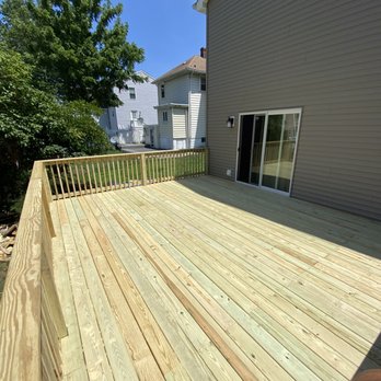 Awad Builders - a deck with railings - General Contractors Near Me - Keyport, New Jersey Awad Builders - a deck with railings - General Contractors Near Me - Keyport, New Jersey