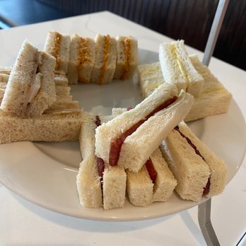 Malaya Tea Room - Left-back-right-front: Turkey/brie/fig jam, curry chicken, coconut jam, pork jerky - Tea Rooms Near Me - Alameda, California