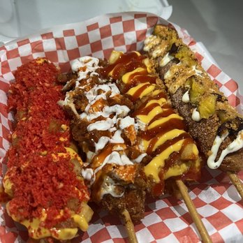 Crispy Streets - Hot Dog with Potato Coating topped with Cheese & Hot Cheetos, Boom Buffalo Chicken, Cheesy Couch Potato, Cuban Guy - Food Trucks Near Me - Miami, Florida