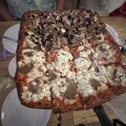 Meatball pizza, half with mushroom and olive & the other half with ricotta. Meatball pizza, half with mushroom and olive & the other half with ricotta.