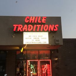 a neon sign for a mexican restaurant