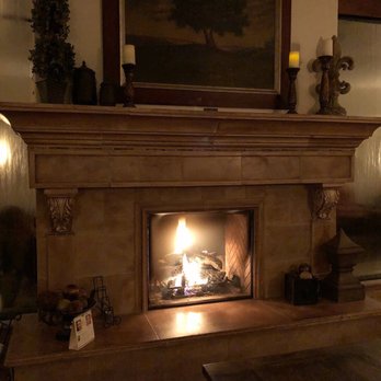 Sego Lily Spa - The waiting area has a double sided fireplace, comfy couches, snack, tea, and water. - Day Spas Near Me - Midvale, Utah