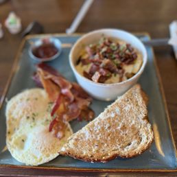Traditional breakfast with million dollar potatoes.