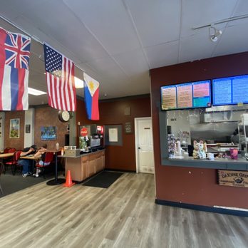 Dakine Grindz Restaurant - Inside with the place to order on the right side where menu screens are - Filipino Near Me - Sunset, Utah