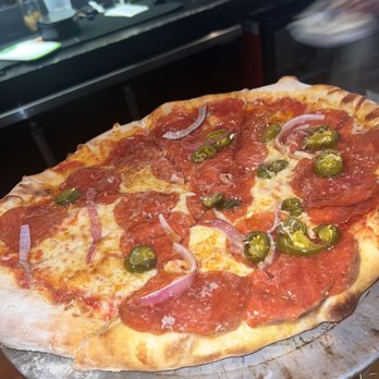 Central Pizza & Bar - Paulie - Bars Near Me - Lafayette, Louisiana Central Pizza & Bar - Paulie - Bars Near Me - Lafayette, Louisiana