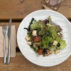 The Green Kitchen Cafe - Mixed greens with seaweed, tofu and sesame.