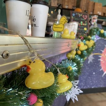 Captain Quack's Coffeehouse - Rubber duckies in their holiday garlands for a festive atmosphere at Captain Quackenbush - Bakeries Near Me - Austin, Texas Captain Quack's Coffeehouse - Rubber duckies in their holiday garlands for a festive atmosphere at Captain Quackenbush - Bakeries Near Me - Austin, Texas