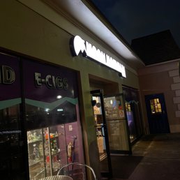 the outside of a restaurant at night the outside of a restaurant at night