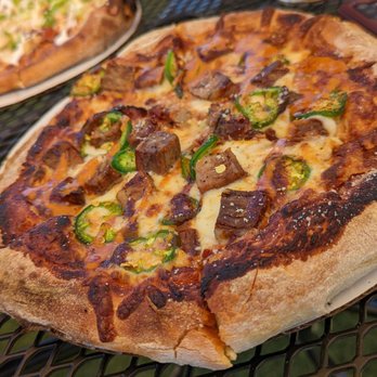 Pine Marten Pizza - three pizzas on a table - Pizza Near Me - Bend, Oregon Pine Marten Pizza - three pizzas on a table - Pizza Near Me - Bend, Oregon