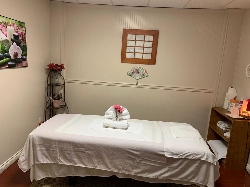 Carnation Asian Massage Logo