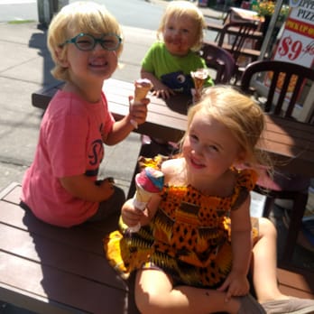 Jubilee Junction - Kids eating the multi-colour Moon Mist and Super Hero ice cream out front of the Jubilee Junction. - Burgers Near Me - Halifax, Nova Scotia