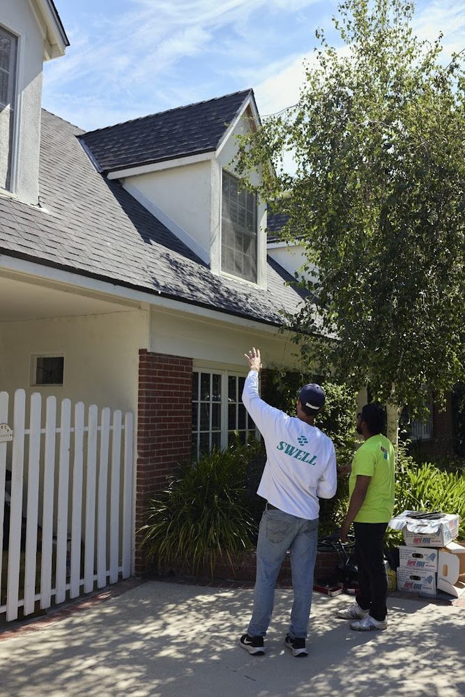 Slide of Swell Roofing