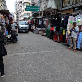 花園街 (波鞋街) - Cars driving in the street with street vendors - Shoe Stores Near Me - Hong Kong, HK 花園街 (波鞋街) - Cars driving in the street with street vendors - Shoe Stores Near Me - Hong Kong, HK