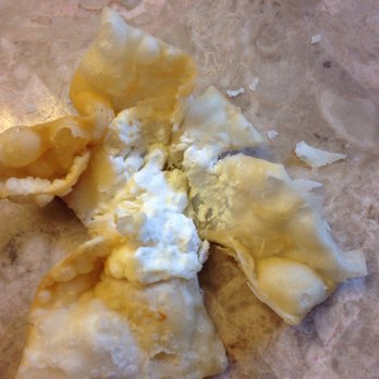 China Coast - a partially eaten pastry on a piece of parchment paper - Chinese Near Me - Rockland, Maine