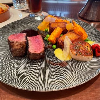 Tiffins Restaurant - Surf & Turf - New American Near Me - Lake Buena Vista, Florida Tiffins Restaurant - Surf & Turf - New American Near Me - Lake Buena Vista, Florida