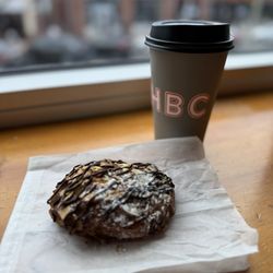 Hartford Baking - Chocolate almond croissant and hot coffee.