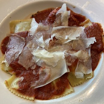 Angelo’s Taverna - Bison ravioli with a house marinara sauce and Parmesan cheese flakes. - Italian Near Me - Denver, Colorado Angelo’s Taverna - Bison ravioli with a house marinara sauce and Parmesan cheese flakes. - Italian Near Me - Denver, Colorado