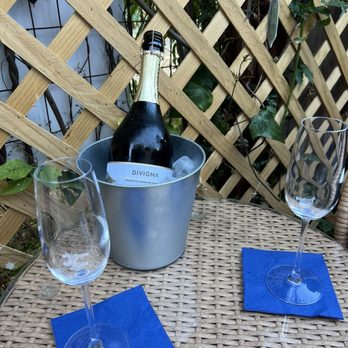 Adega Azul - Enjoying Our sparkling wine on the outdoor patio in the back - Wine Bars Near Me - Berkeley, California