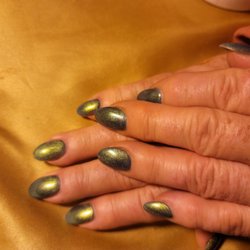 Naturally Nails - Kathy's finger nail done up in green for Christmas