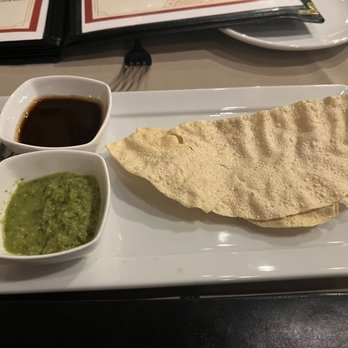 India Palace - Crispy opener with flavorful sauces--the green has a cilantro, garlic spiciness to it and the other is a onion and tamarind sweet sauce. - Indian Near Me - Santa Fe, New Mexico