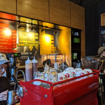 Novo Coffee - The baristas hard at work. - Coffee & Tea Near Me - Denver, Colorado Novo Coffee - The baristas hard at work. - Coffee & Tea Near Me - Denver, Colorado