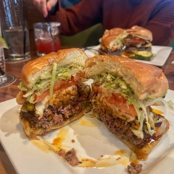 BRU Burger Bar - Mexicali BBQ Burger: White Queso, Pickled Jalapeño, Guacamole, Fried Onion, House Chipotle BBQ Sauce, Lettuce, Tomato - Salad Near Me - Bloomington, Indiana