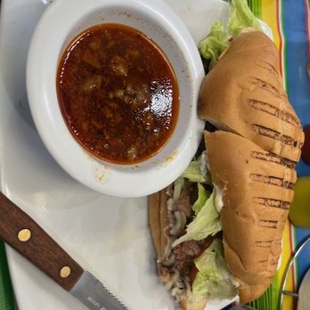 Taqueria 2 Brothers - Bisteca Torta, dressed, with dipping sauce. - Tacos Near Me - Terrytown, Louisiana Taqueria 2 Brothers - Bisteca Torta, dressed, with dipping sauce. - Tacos Near Me - Terrytown, Louisiana