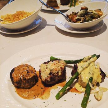 Eddie Merlot's - Trio of medallions, mac and cheese, and Brussel sprouts - Seafood Near Me - Columbus, Ohio Eddie Merlot's - Trio of medallions, mac and cheese, and Brussel sprouts - Seafood Near Me - Columbus, Ohio