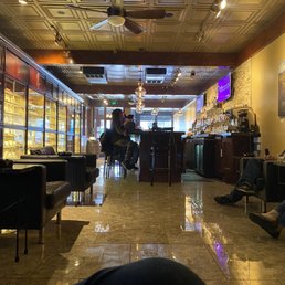 Bar area. Humidor is not only what you see on the left-hand side but also on the other side of that wall is a huge humidor Bar area. Humidor is not only what you see on the left-hand side but also on the other side of that wall is a huge humidor