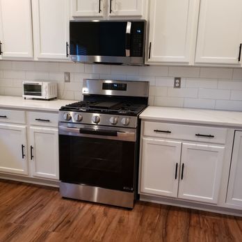 Home Pro Remodeling - Remodeled Kitchen with LVP Flooring - Painters Near Me