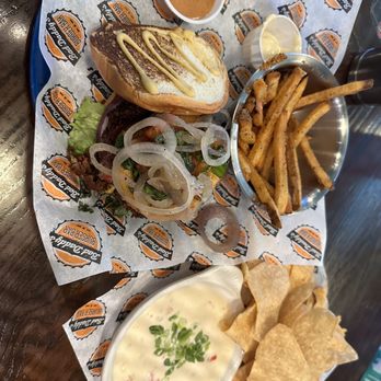 Bad Daddy's Burger Bar - Queso and burger with fries - Bars Near Me - Roswell, Georgia Bad Daddy's Burger Bar - Queso and burger with fries - Bars Near Me - Roswell, Georgia