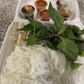 Sprout's Springroll & Pho - My Beef round steak pho to go, with extra Hoisen and sriracha sauce. - Vietnamese Near Me - Arlington, Texas Sprout's Springroll & Pho - My Beef round steak pho to go, with extra Hoisen and sriracha sauce. - Vietnamese Near Me - Arlington, Texas