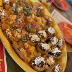 Fat Rosie's Taco and Tequila Bar - Family platter ceviche, Molay, potato empanada, guacamole, so good
