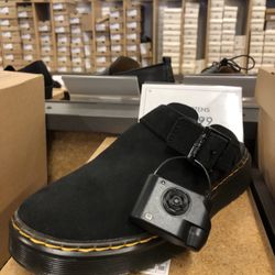 DSW Designer Shoe Warehouse - The winning pair, Doc Martens suede slide that has a convertible strap for the back. Fabulous.