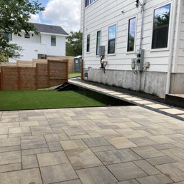 a patio with artificial grass