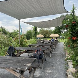 Old Salt Cocktails - Lots of seating amongst flowers