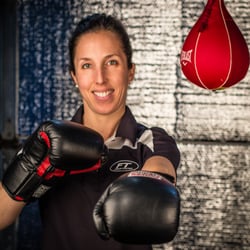 Fitness Together - Hannah showing how some clients love the punching bag!
