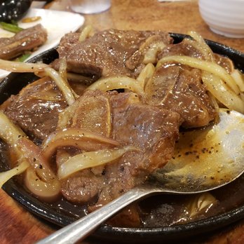 Hing Kee Restaurant - Sizzling black pepper short ribs - Vietnamese Near Me - Chicago, Illinois Hing Kee Restaurant - Sizzling black pepper short ribs - Vietnamese Near Me - Chicago, Illinois