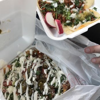 Taqueria Janitzio - The enormous, delicious nachos and mouth watering Al Pastor tacos!!! - Mexican Near Me - Delano, California Taqueria Janitzio - The enormous, delicious nachos and mouth watering Al Pastor tacos!!! - Mexican Near Me - Delano, California