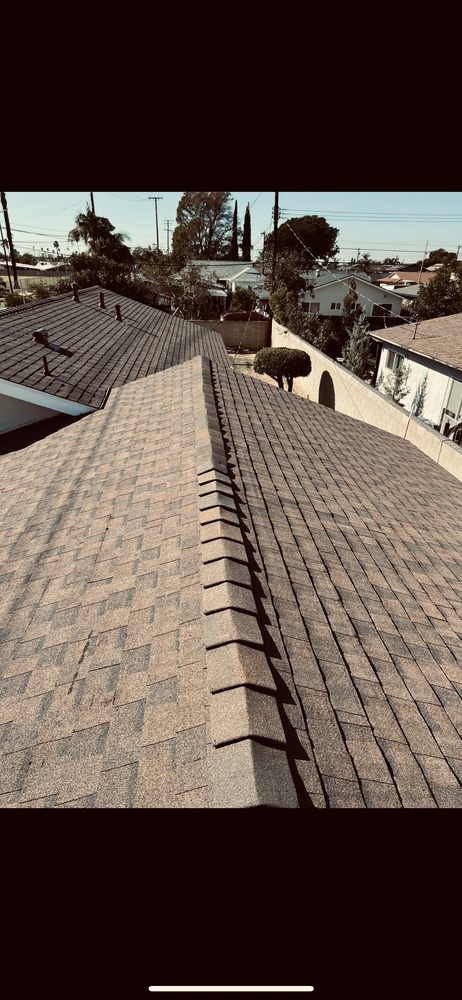 Slide of Leon K Miller Roofing