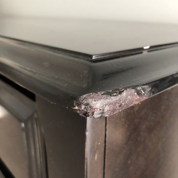 Ashley Store - Broken corner that was covered with stain. I was refused a new dresser. - Furniture Stores Near Me - Dover, Delaware